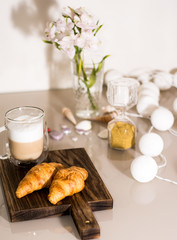 breakfast with coffee and croissant 