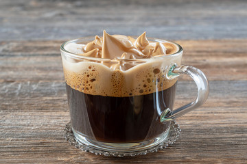 Korean Dalgona coffee is a popular drink made by whipping in equal proportions instant coffee powder, sugar and hot water.
