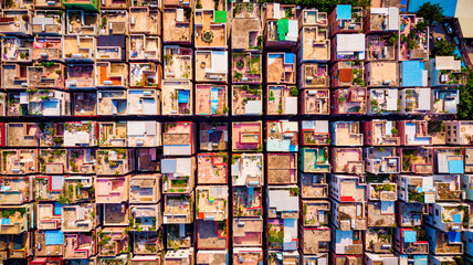 Aerial populated village buildings in a city