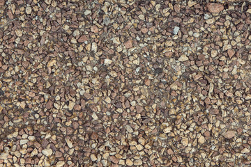 Stone path background above. Close up Wallpaper. Many stones. Stones small and large. Different size and color stones. building stone