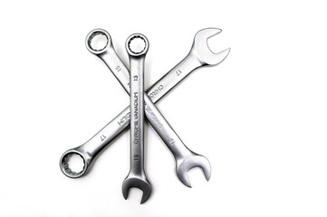 Spanner Set Isolated. Silver coloured spanners lying side by side in white background.