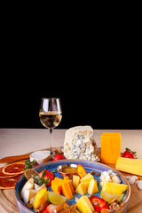 restaurant dish on a plate and ingredients that it includes