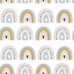Kids hand drawn seamless pattern with colorful pastel rainbows. Summer background. Vector illustration for baby design. Scandinavian style