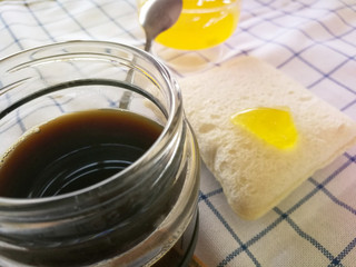 table set with coffee white bread  and orange juice