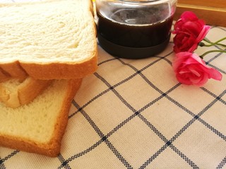 table set with coffee and white bread