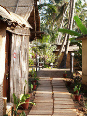 Beach huts and cottages made from bamboo,clay tiles and coconut leaves. Holiday destination concept images in Goa, India. Scenic Vacation and nature images for travel