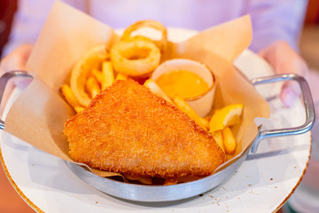 Delicious tasty look crispy fish and chip with dipping sauce fatty deep fried western food menu