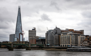 The Shard skyscraper, group of buildings and river Thames, London