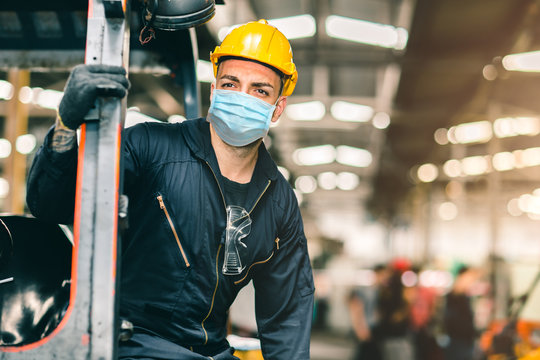 Worker wear disposable face mask for protection Corona Virus Spreading and Smoke dust air pollution filter in factory for healthy labor care.