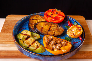 restaurant dish on a plate and ingredients that it includes