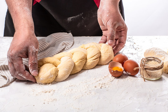 Shabbat or Shabath concept. baker making traditional challah jewish bread Traditional Jewish Shabbat ritual
