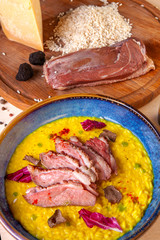 restaurant dish on a plate and ingredients that it includes