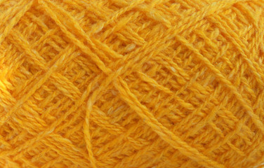 close up of yellow wool yarn