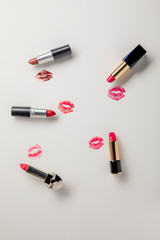 lipstick on white background with kisses