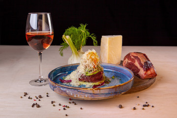 restaurant dish on a plate and ingredients that it includes