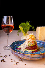 restaurant dish on a plate and ingredients that it includes