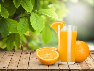 Orange juice in glass and slices of orange fruit © BillionPhotos.com