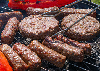 Cevapcici, Burgers and Paprika on the grill.