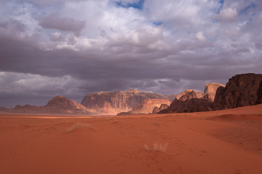 red wadi rum desert in jordan under the dramatic sky © Lana Kray