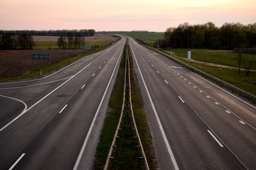 Road for cars in the evening at sunset
