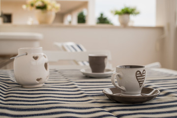 furnished table for coffee break on the balcony