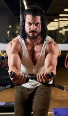 Fototapeta na wymiar bodybuilder training with dumbbells, muscular man lifting weights, muscular man is training in gym