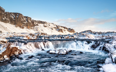 Fast flowing waterfall in the Hof area of southern Iceland