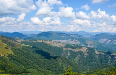 Naklejka na ściany i meble Mountain landscape large stones relief in the foreground. Summer Gorgany, natural scenery of Ukrainian Carpathians