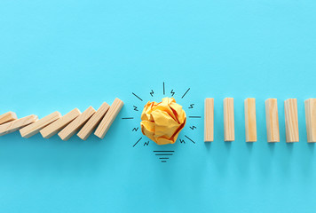 Education concept image. Creative idea and innovation. Crumpled paper as light bulb metaphor over...
