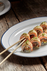 Sushi set sashimi rolls served on