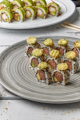 Sushi set sashimi rolls served on