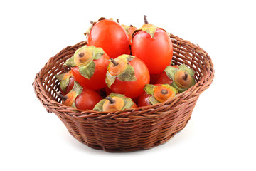 Persimmons on dish