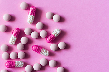 Pills, medicine for pneumonia, antibiotics on an pink background, Coronavirus, MERS-CoV, Wuhan coronavirus 2019-nCoV,concept of Corona virus quarantine,Covid-19.