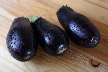 Aubergines on table