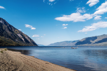 Naklejka premium Landscape overlooking a mountain lake. Russia, Altai Republic, Ulagansky District, Lake Teletskoye, Cape Kirsay