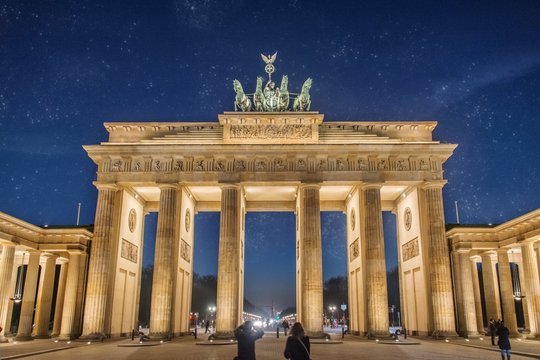 Illuminated Brandenburg Gate Against Star Field