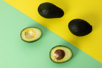 Fresh avocados on fashion minimalism style background
