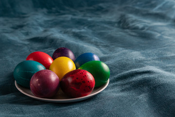 colored eggs in a plate for Easter