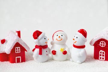 Christmas toy snowmen red houses, new year holiday background