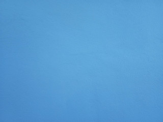 Smooth surface blue cement wall background