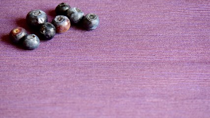 blueberries on a linen background with copy space 