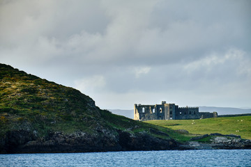 An abandoned ruined castle in the countryside of Connemara, Ireland.