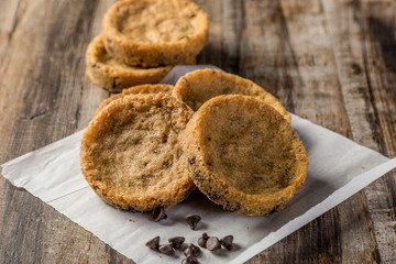 homemade chocolate chip cookies on wooden table