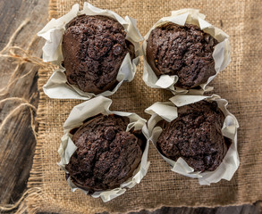 homemade cupcakes on wooden table