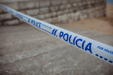 Police sign at closed beach