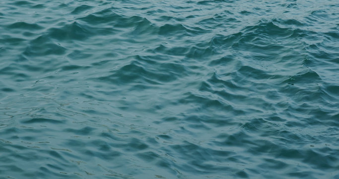 Turquoise sea waves on beach © leungchopan