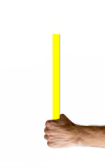 The left hand holds a yellow stick. flagpole. blank for design