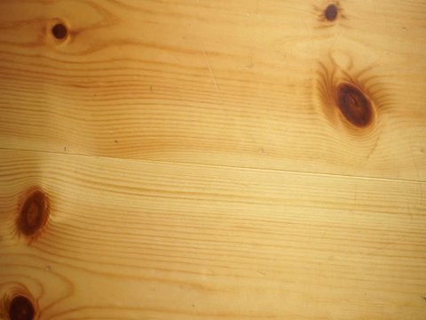 Rolling D6 dices on light pine wooden surface closeup roleplaying playing, wargaming tabletop