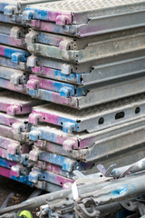 Heap of iron beams on construction site