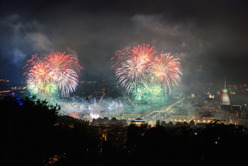 Panoramic view of Turin with fireworks at the feast of San Giovanni